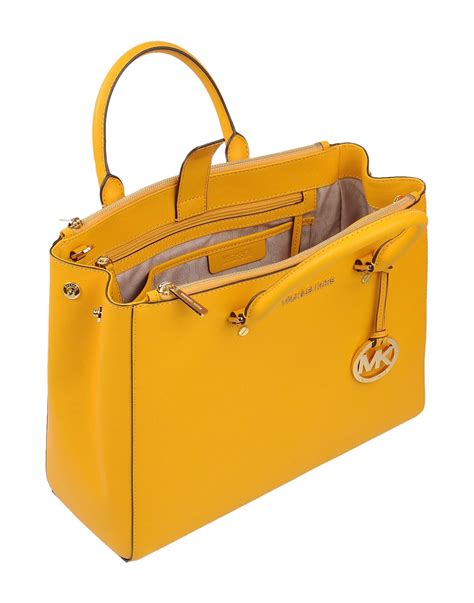 yellow michael kors handbag.